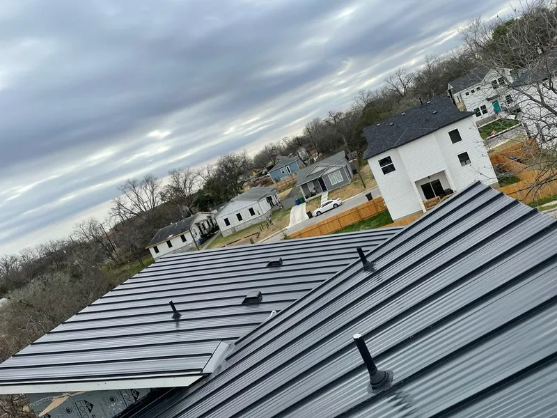 Standing seam metal roof panels with vents for Skylight Repair in Mounds View